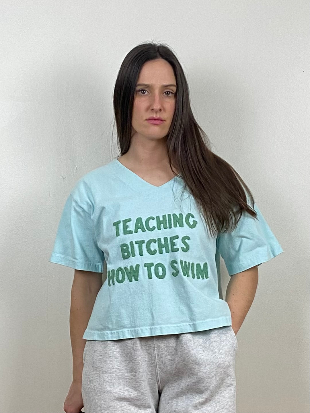 TEACHING BITCHES HOW TO SWIM T-SHIRT